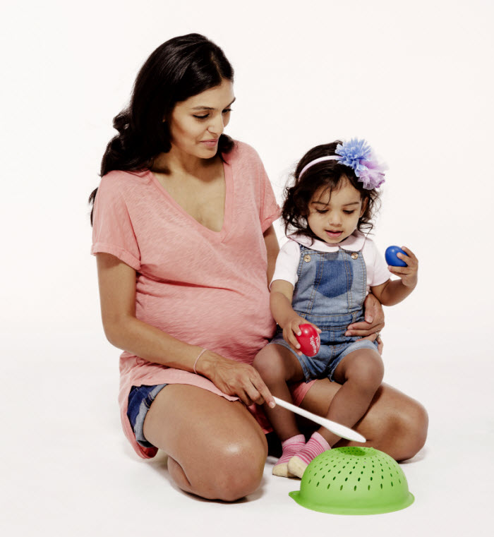 Mommy and baby playing music
